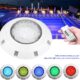 Waterproof RGB LED underwater swimming pool light with remote control for pools, fountains, ponds, and landscape lighting.