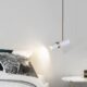 Minimalist Nordic LED pendant spotlight with adjustable hanging cable in black or white finish.