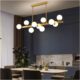 Modern LED glass pendant light with metal construction and soft ambient illumination for contemporary interiors.