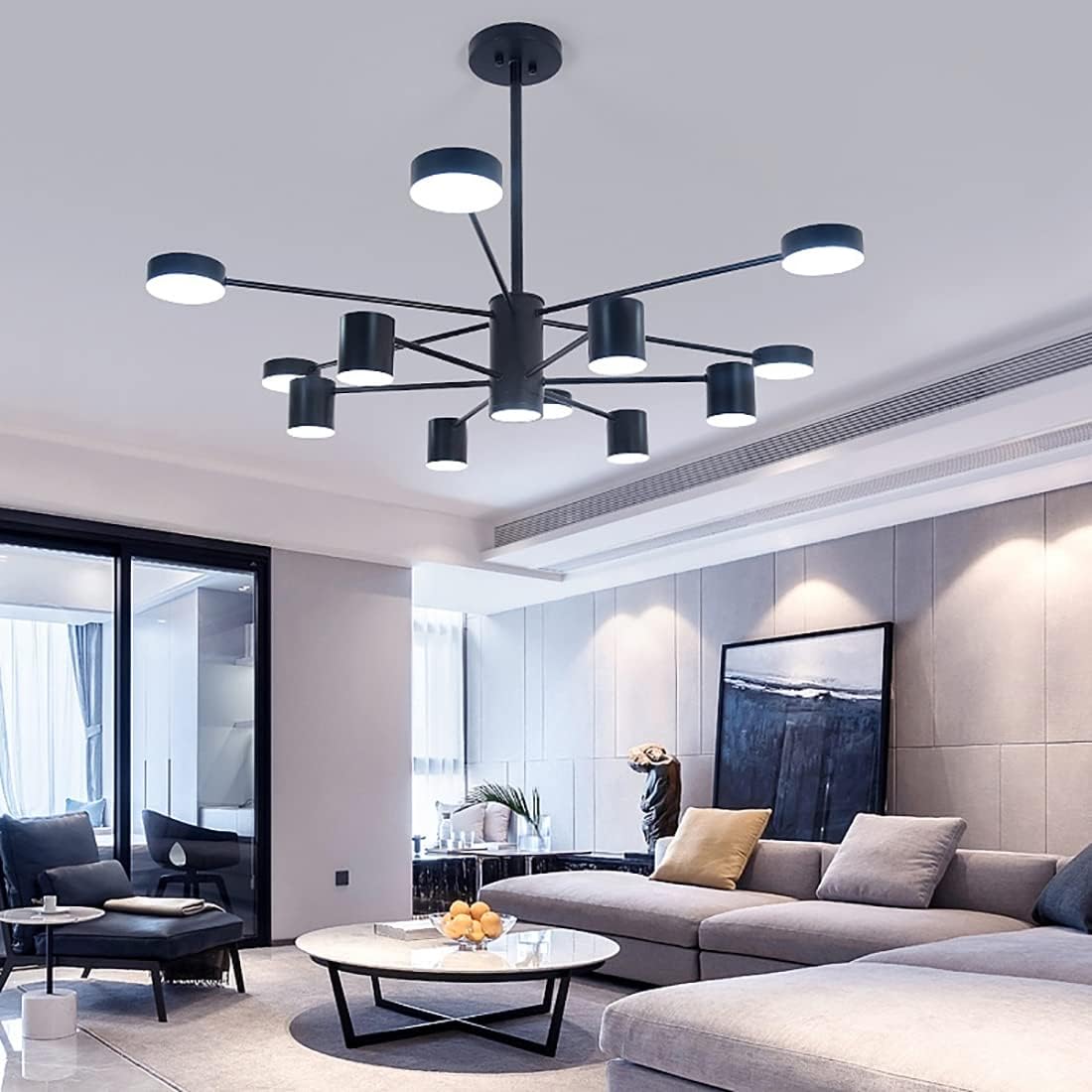 Modern 12-ring 50W LED chandelier with adjustable height and warm, neutral and cool white lighting.